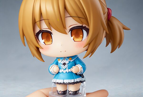 She is a cute anime girl with expressive big brown eyes and brown hair tied in a ponytail. Nendoroid miniature character, soft rounded shape